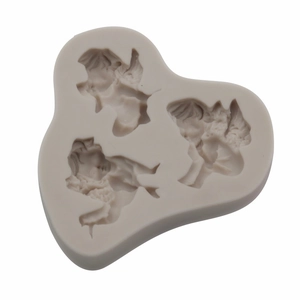 Detail view of 3-cavity silicone mold featuring wing angel shapes for resin and plaster crafts