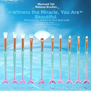 Detail of 10-piece mermaid makeup brush set with gradient fishtail handles and soft bristles