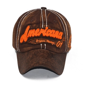 Detailed 3D embroidery of Americana text on vintage wash cotton baseball cap