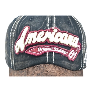 Close-up of vintage distressed baseball cap with Americana 3D embroidery and stitching