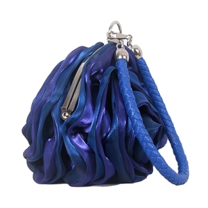 Close-up of navy blue satin evening bag featuring delicate 3D floral pleated texture