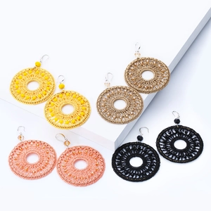 Bohemian large round woven beaded hoop earrings for women in yellow, pink, and black