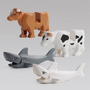 Educational animal building blocks set with toy cows and sharks for kids development
