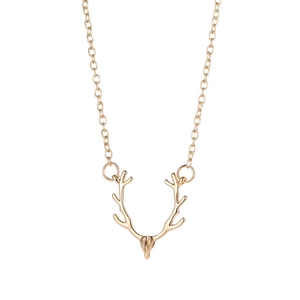 Elegant gold reindeer antler pendant necklace with delicate chain on white background