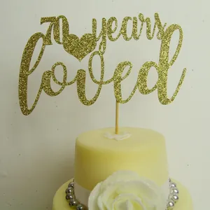 Glittering gold '70 years loved' cake topper for 70th wedding anniversary decorations