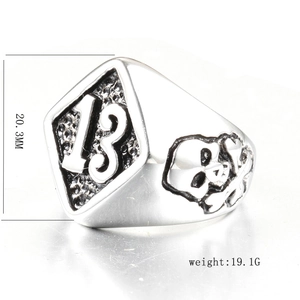 Detail showing vintage silver skull ring with number 13 engraving and 20.3mm measurement