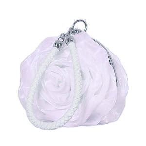 Close-up of white silk rose petals texture and braided handle on mini evening bag
