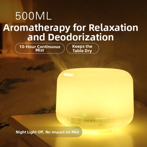 Close-up of 500ML aroma diffuser buttons showing 10-hour continuous mist and timer modes