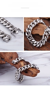 Detailaufnahme eines silbernen Panzerarmbands mit texturiertem seitlichem Sicherheitsverschluss