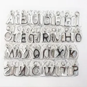 Detailed collection of 26 silver alphabet charms with polished finish and hanging rings