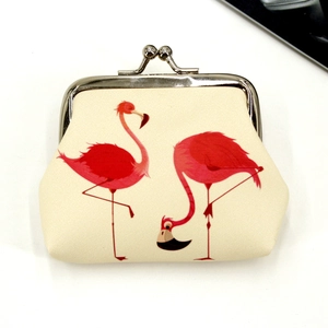 Close-up of flamingo print on canvas coin purse with silver metal clasp closure