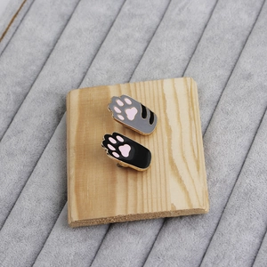 Cute cartoon cat paw enamel pins set in black and grey with pink pads for bags and clothes