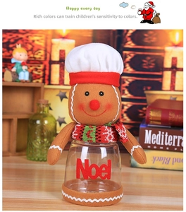 Detail of gingerbread man Christmas candy jar with Noel lettering and a chef hat