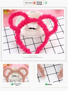 Close-up of pink plush mouse ears headband with soft faux fur and spring design