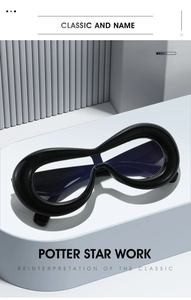 Detail of chunky infinity shaped black frames with a modern avant-garde aesthetic