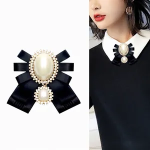 Elegant black silk ribbon bow brooch with large pearls and sparkling rhinestones for shirts