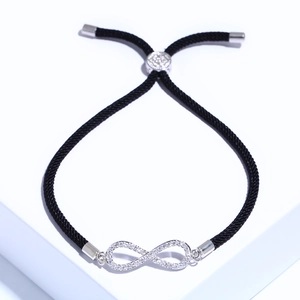Bracciale intrecciato nero minimalista con simbolo infinito argento e zirconi brillanti