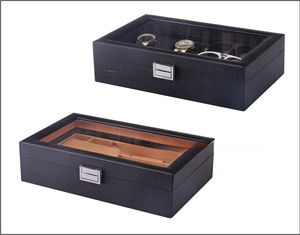 Macro detail of carbon fiber watch box with 6 slots and 3 eyewear compartments