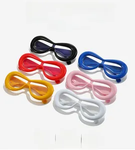 Detail of unique infinity shaped fashion glasses in six vibrant glossy finish colors