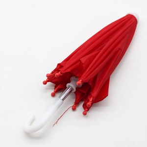 Closed red doll umbrella with white curved handle for 18 inch American Girl dolls