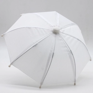 Detailed view of a white miniature umbrella accessory for 18-inch American Girl dolls