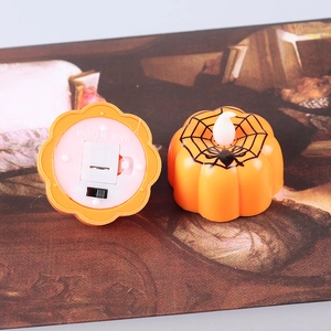 Halloween orange LED pumpkin lantern with spider web pattern and bottom switch details