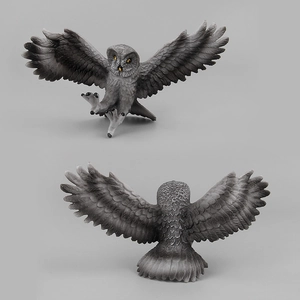 Lifelike owl figurine with detailed grey feathers in flying pose, front and back views