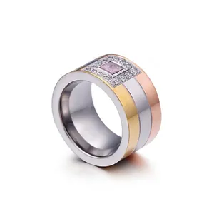 Three-tone titanium steel band featuring a square pink center stone and pavé halo setting