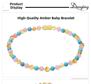 Détails du collier pour bébé en ambre et quartz rose avec fermoir à vis sécurisé