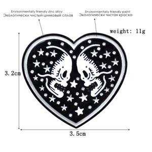 Gothic black heart enamel pin with white skull and stars pattern for bags and hats