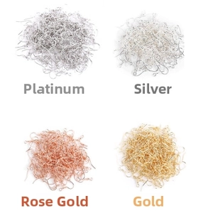 Detail of DIY jewelry ear hook accessories in silver, gold, and rose gold metal finishes