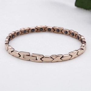 Rose gold stainless steel magnetic health bracelet with X-shaped links and clasp