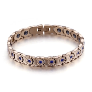 Rose gold stainless steel bracelet with blue crystals and XO link pattern design