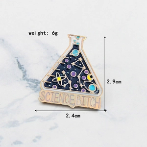 Science flask enamel pin with blue space patterns and 'SCIENCE' banner text