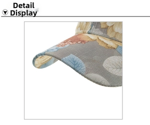 Close-up of vintage floral lace print on coarse canvas baseball cap visor