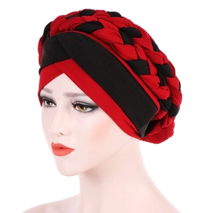 Detail view of the intricate red and black braided texture on this milk silk turban hat