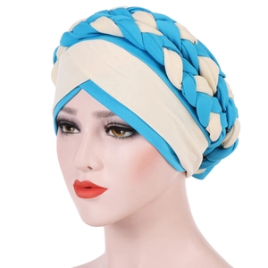 Detail of two-tone braided turban in sky blue and cream white on a model head