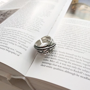 Detail of S925 hallmark on a retro style oxidized silver layered open ring