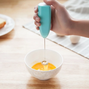 Electric handheld milk frother in cyan with stainless steel whisk for kitchen coffee mixing
