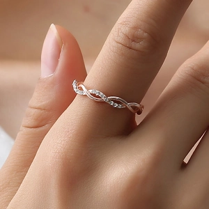 Elegance rose gold plated twisted cable ring with pave set sparkling cubic zirconia stones