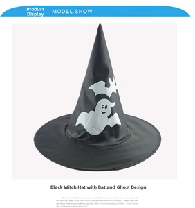 Close-up of black Halloween witch hat with white ghost and bat prints on wide brim