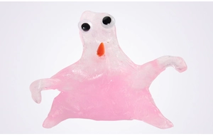 Detail showing a pink translucent slime figure with large plastic eyes and an orange nose