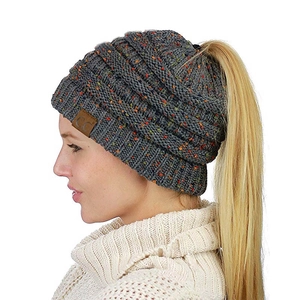 Detail view of dark grey chunky knit ponytail beanie with colorful flecks and CC logo patch