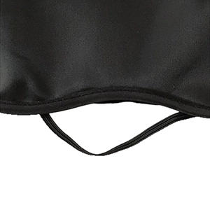 Polyester blackout sleep mask in black with elastic strap for travel and restful sleep