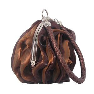 Detail of bronze silk evening bag showing layered 3D floral design and silver metal clasp
