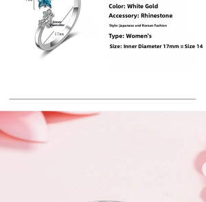 Detailed size view of adjustable silver star ring with blue rhinestone and clear stones
