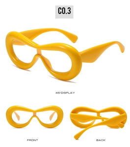 Three-dimensional view of vibrant yellow oversized fashion frames with sleek thick design