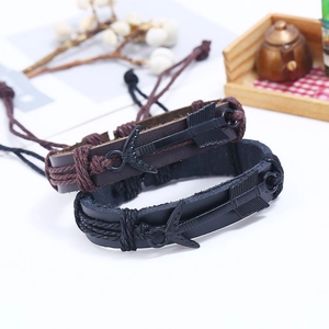 Punk woven leather bracelets with black arrow charms in brown and black leather variants