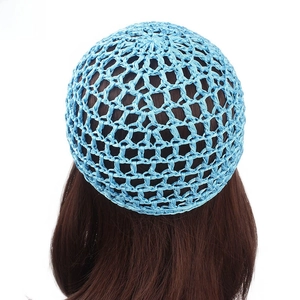 Detail of sky blue crocheted hair snood on brown hair with a large bow accent