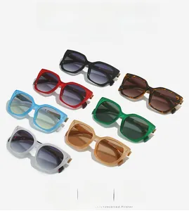 Detailed view of square sunglasses in seven vibrant colors with metal hinge accents